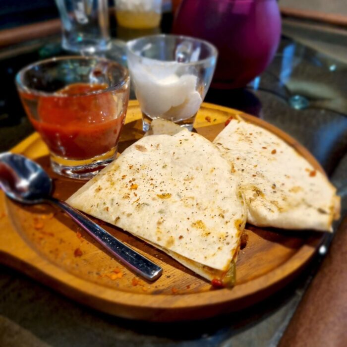 Grilled Chicken Quesadilla done your way on order in high thai bangkok. Grilled chicken, cheese, jalapeno, Who's Sauce. Served with sour cream and salsa.