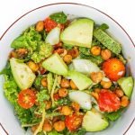 Roasted chickpeas and avocado in Italian mama dressing in high thai weed
